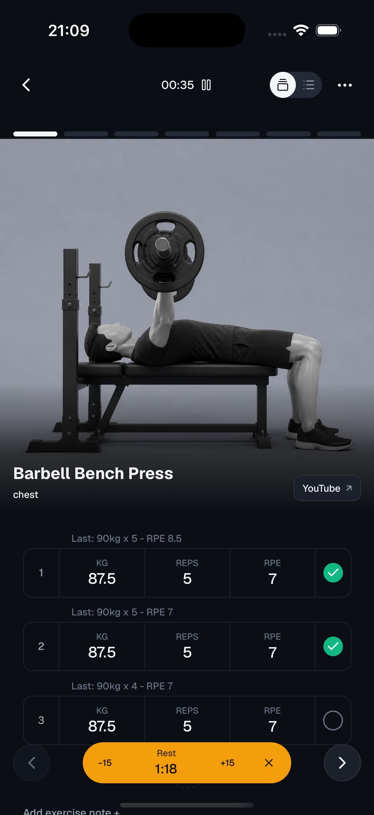 Active workout screen with sets, effort ratings and a rest timer